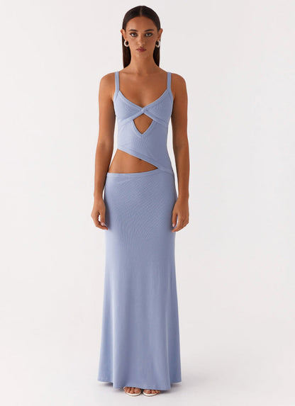Front view of a women's bodycon maxi dress in light blue with a unique cut-out design at the waist and bust.