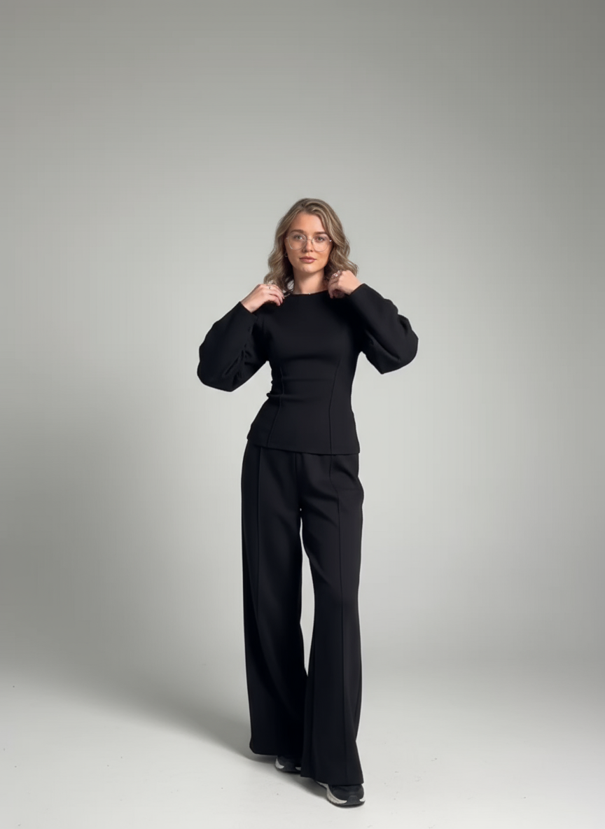 Black women's work long sleeve top with high-waist wide leg pants set, front view