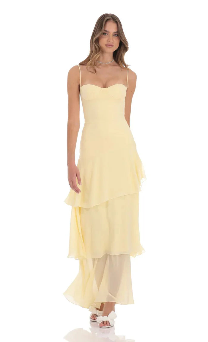 Pale yellow tiered ruffle maxi dress with sweetheart neckline and thin straps, front view